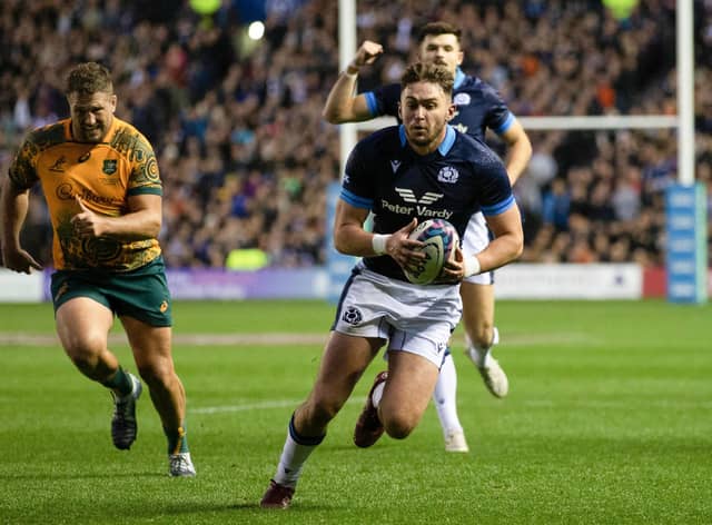 Ollie Smith scores a try against Australia in October, with Blair Kinghorn cheering him on in the background. The pair will start against Italy.  (Photo by Craig Williamson / SNS Group)
