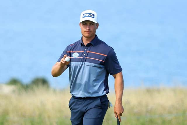 Calum Hill acknowledges the crowd on the 12th hole. Picture: Andrew Redington/Getty Images.