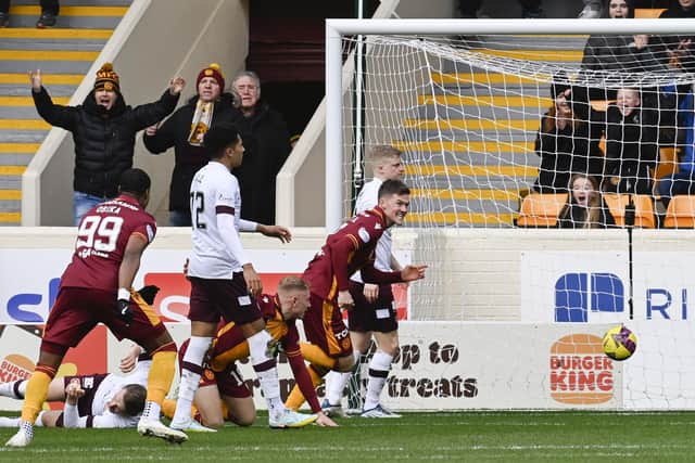 Motherwell's Blair Spittal celebrates after making it 2-0 against Hearts. (Photo by Rob Casey / SNS Group)