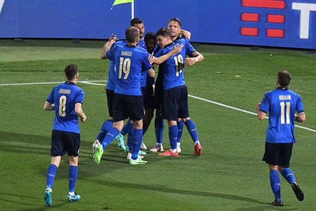 Ciro Immobile celebrates with his team-mates after giving Italy the lead. Picture: Getty
