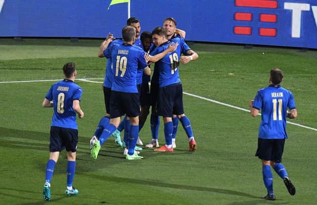 Ciro Immobile celebrates with his team-mates after giving Italy the lead. Picture: Getty