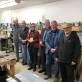 Gillian Martin MSP with Ellon & District Men’s Shed Chairman Andy Leonard (far left)and Shed members.