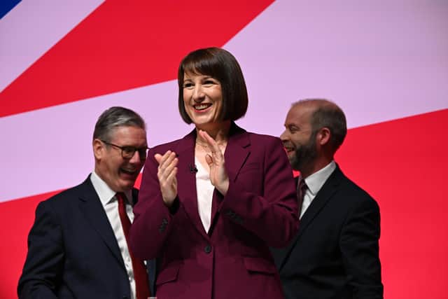 Chancellor Rachel Reeves flanked by Prime Minister Keir Starmer and Business Secretary Jonathan Reynolds  (Picture: Leon Neal/Getty Images)