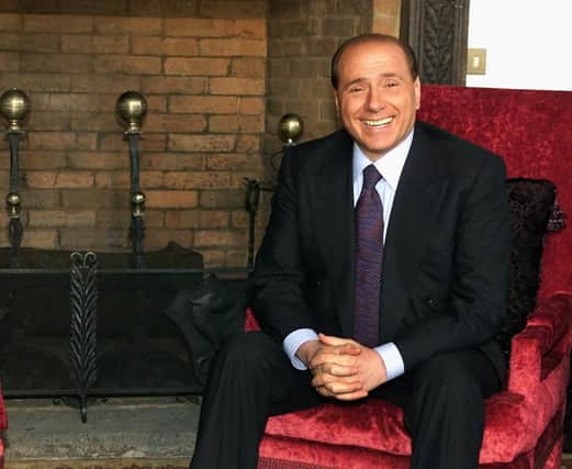 Silvio Berlusconi at one of his official residences in Rome in 2002 (Picture: Gabriel Bouys/AFP/Getty Images)
