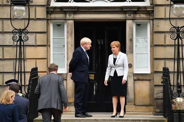 Nicola Sturgeon greets Boris Johnson on the steps of Bute House in Edinburgh in 2019 (Picture: Jeff J Mitchell/Getty Images)