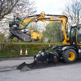 JCB's PotholePro machine in action in Alness today. Picture: JCB