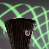 The UEFA Conference League trophy. (Photo by Fabrice COFFRINI / AFP) (Photo by FABRICE COFFRINI/AFP via Getty Images)
