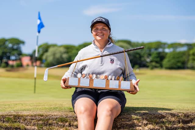 Australian Kirsten Rudgeley shows off the Helen Holm Scottish Women's Open Trophy after her win at Royal Troon Portland Course. Picture: Scottish Golf.