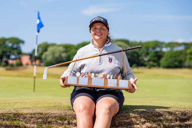 Australian Kirsten Rudgeley shows off the Helen Holm Scottish Women's Open Trophy after her win at Royal Troon Portland Course. Picture: Scottish Golf.