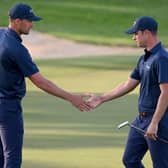 Continental Europe duo Guido Migliozzi and Victor Perez shake hands after beating Seamus Power and Bob MacIntyre in the Saturday afternoon foursomes session. Picture: Ross Kinnaird/Getty Images.