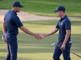 Continental Europe duo Guido Migliozzi and Victor Perez shake hands after beating Seamus Power and Bob MacIntyre in the Saturday afternoon foursomes session. Picture: Ross Kinnaird/Getty Images.