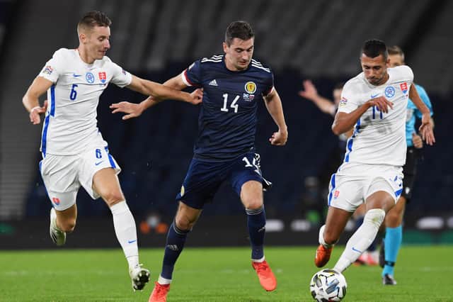 Kenny McLean holds off Slovakia's Jan Gregurs during Scotland's 1-0 win at Hampden in October. Picture: SNS