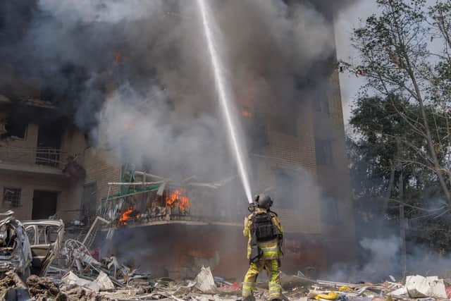 A firefighter tackles a blaze in a tower block in Kramatorsk, Ukraine, following a Russian air attack last week (Picture: Ukrainian Emergency Service via AP)