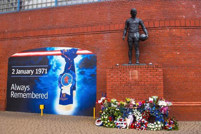 The statue of John Greig at the memorial outside Ibrox Stadium to the 66 supporters who lost their lives in the disaster on January 2, 1971. (Photo by Gary Hutchison, SNS Group).