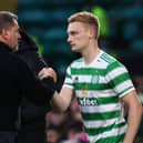 Celtic manager Ange Postecoglou with Liam Scales in October 2021 - the Irish defender has been on loan at Aberdeen this season.  (Photo by Craig Williamson / SNS Group)