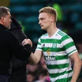 Celtic manager Ange Postecoglou with Liam Scales in October 2021 - the Irish defender has been on loan at Aberdeen this season.  (Photo by Craig Williamson / SNS Group)