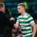 Celtic manager Ange Postecoglou with Liam Scales in October 2021 - the Irish defender has been on loan at Aberdeen this season.  (Photo by Craig Williamson / SNS Group)