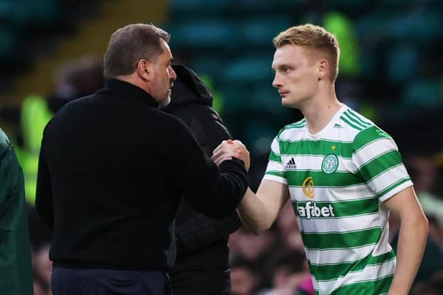 Celtic manager Ange Postecoglou with Liam Scales in October 2021 - the Irish defender has been on loan at Aberdeen this season. (Photo by Craig Williamson / SNS Group)