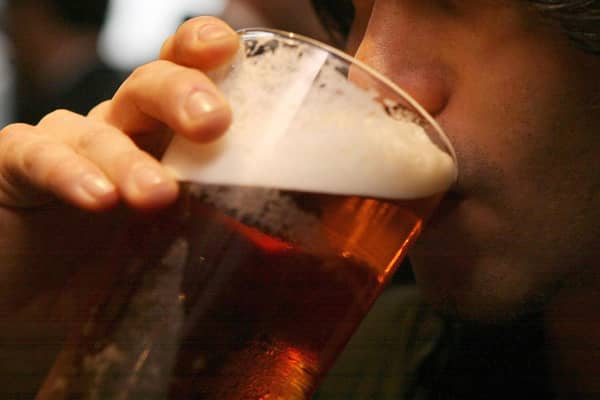 File photo dated 01/12/06 of a man drinking a pint of beer, as campaigners are urging people to show compassion towards those who have lost someone due to alcohol or other drugs in an effort to reduce the stigma associated with alcohol-related deaths.