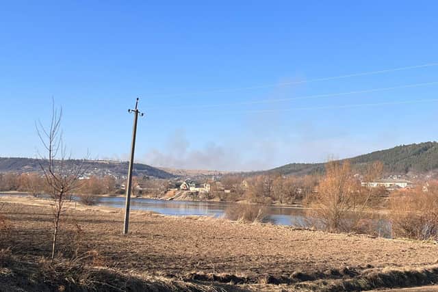 Smoke rising on the Ukrainian side of the border was an artillery strike, according to locals.