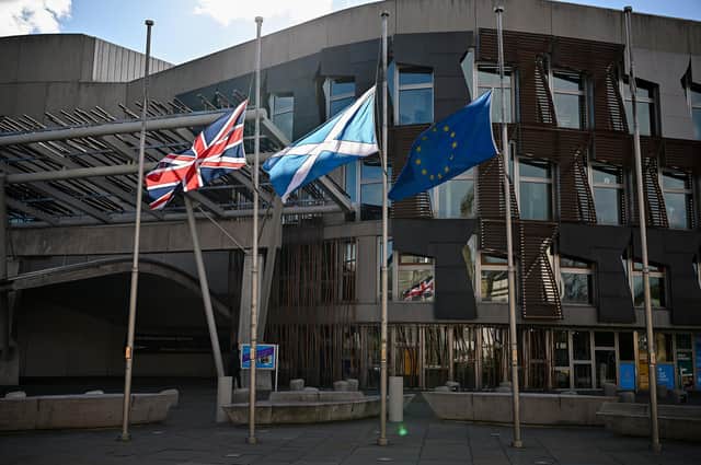 Flags fly at half mast outside the Scottish Parliament in Edinburgh to mark the death of the Duke Of Edinburgh (Photo by Jeff J Mitchell/Getty Images).