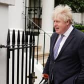 Former prime minister Boris Johnson refused to answer questions about his evidence on Tuesday morning.