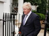 Former prime minister Boris Johnson refused to answer questions about his evidence on Tuesday morning.