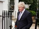 Former prime minister Boris Johnson refused to answer questions about his evidence on Tuesday morning.