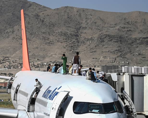 An Afghan student seeking asylum has said she has lost hope she can complete her education and has pleaded with Western governments not to "forget Afghan women". (Photo by Wakil Kohsar/AFP)