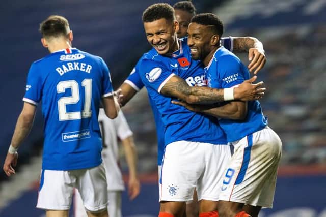 Feeling good: James Tavernier celebrates making it 8-0 with Jermain Defoe. (Photo by Alan Harvey / SNS Group)