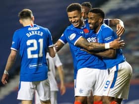 Feeling good: James Tavernier celebrates making it 8-0 with Jermain Defoe. (Photo by Alan Harvey / SNS Group)