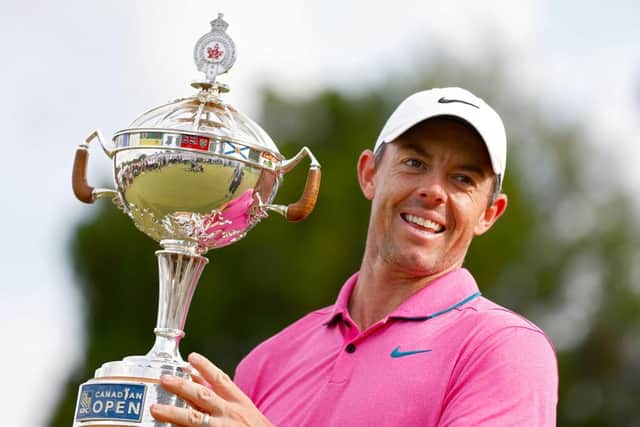 Rory McIlroy shows off the trophy after winning the RBC Canadian Open at St. George's Golf and Country Club in Ontario. Picture: Vaughn Ridley/Getty Images.