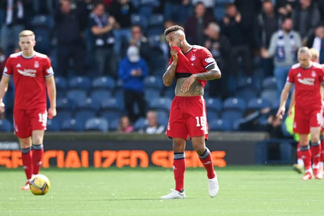 Aberdeen's players trudge off the Stark's Park pitch after losing 2-1 to Raith and exiting the Premier Sports Cup.
