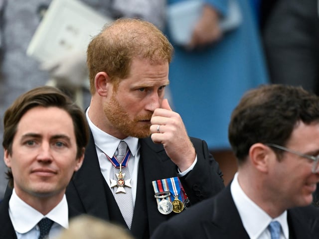 (Left to right) Edoardo Mapelli Mozzi, the Duke of Sussex and Jack Brooksbank depart Westminster Abbey, London, following the Coronation of King Charles III and Queen Camilla.