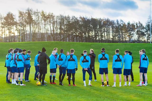 Robbie Neilson addresses the Hearts squad at Riccarton.