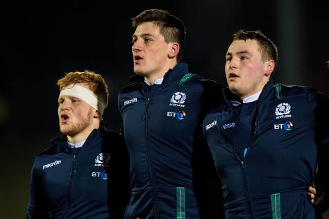 Ewan Johnson, centre, with team-mates Robbie Smith, left, and Shaun Gunn before a Scotland U20 match against England in 2018. Both Johnson and Smith are in the full Scotland squad for the 2024 summer tour. (Photo: Ross Parker/SNS)