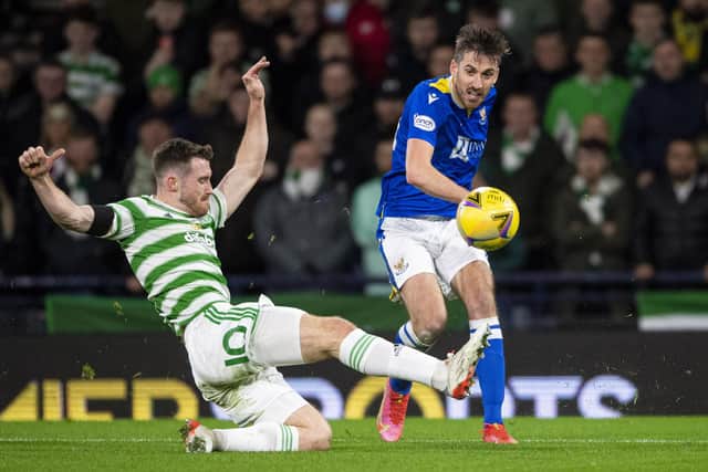 St Johnstone's Callum Booth and Celtic's Anthony Ralston during a Premier Sports Cup semi-final match between Celtic and St Johnstone at Hampden Park, on November 20, 2021, in Glasgow, Scotland. (Photo by Ross MacDonald / SNS Group)