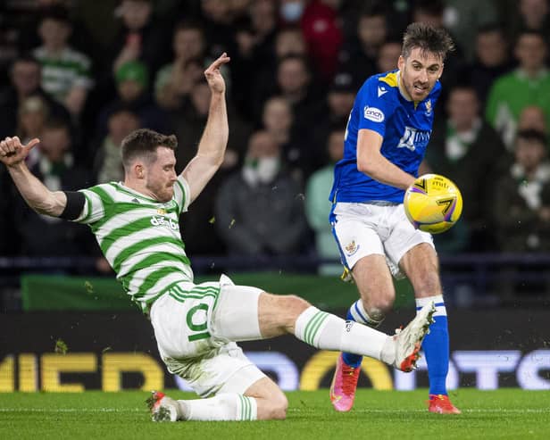 St Johnstone's Callum Booth and Celtic's Anthony Ralston during a Premier Sports Cup semi-final match between Celtic and St Johnstone at Hampden Park, on November 20, 2021, in Glasgow, Scotland. (Photo by Ross MacDonald / SNS Group)