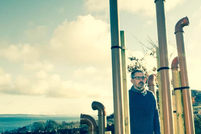 Giles Perring and his World Organ sound sculpture on the Isle of Jura.