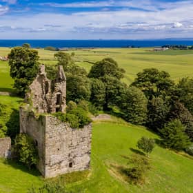 The 15th Century ruined castle has a tennis court.