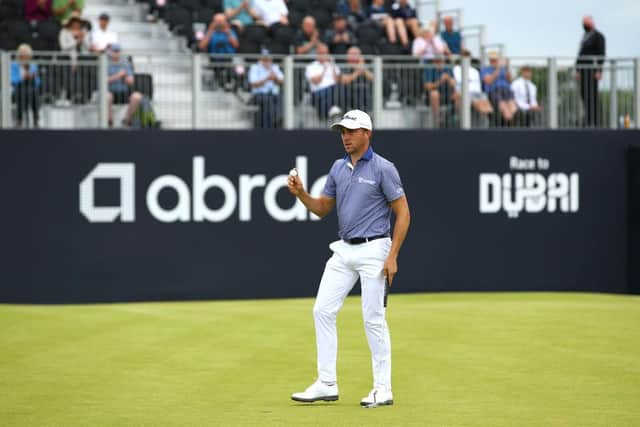 Justin Thomas acknowledges the crowd after finishing his round at The Renaissance Club. Picture: Luke Walker/Getty Images.