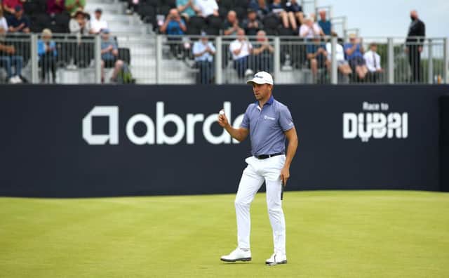 Justin Thomas acknowledges the crowd after finishing his round at The Renaissance Club. Picture: Luke Walker/Getty Images.