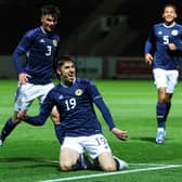 Scotland's Kieron Bowie celebrates after scoring to make it 2-0 over Hungary. (Photo by Ross MacDonald / SNS Group)
