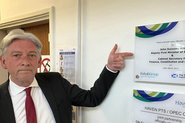 Richard Leonard at the plaque commemorating John Swinney officially opening Haven Products in 2015