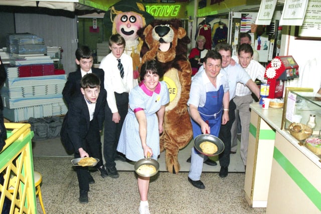 A charity pancake race for the Yellow Brick Road Appeal at the In Shops in the Galleries 30 years ago.