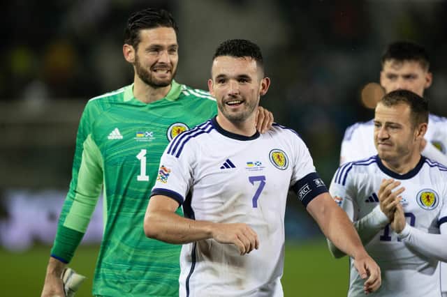 Scotland captain John McGinn and goalkeeper Craig Gordon celebrate after the 0-0 draw with Ukraine. (Photo by Craig Williamson / SNS Group)
