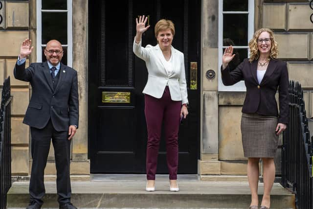 Scottish Greens co-leaders Patrick Harvie and Lorna Slater with former first minister Nicola Sturgeon after signing the Bute House Agreement. Image: Lisa Ferguson.