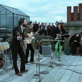 Up on the roof ... The Beatles in their last-ever performance, revived for Peter Jackson's epic Get Back documentary