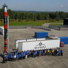 The Skyrora team pictured with the company's rocket, which will launch from a spaceport based on the Shetland island of Unst.