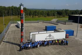 The Skyrora team pictured with the company's rocket, which will launch from a spaceport based on the Shetland island of Unst.